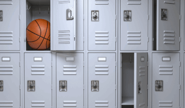 Male high school students under investigation for Title IX violation after they complain about the presence of a female student in locker room